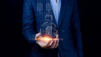 Document Management System DMS, Online documentation database and process automation to efficiently manage files, knowledge and documentation enterprise with ERP. Corporate business technology. photo