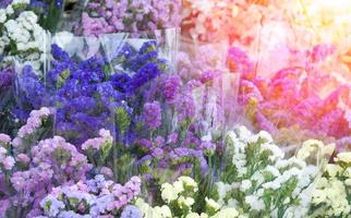 Colorful dried  flower in plastic bag , flower shop in market ,for background photo