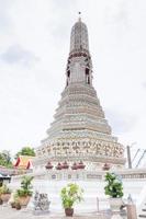 old pagoda isolate in thai temple, Wat Arun is a Buddhist temple with a central spire prang built in khmer style ,architecture Thailand, Temple Bangkok Thailand photo