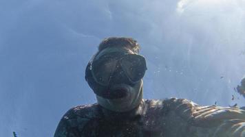 Snorkelist in Mediterranean Sea, Genoa, Italy photo