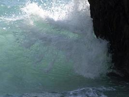 Sea wave on the shore photo