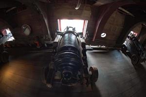 iron cannon on sail ship photo