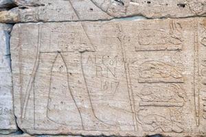 NEW YORK, USA - APRIL 23 2017 - Metropolitan Museum ruined bas relief ancient hieroglyphs on stone detail photo