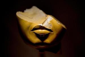 NEW YORK, USA - APRIL 23 2017 - Metropolitan Museum gold egyptian lips statue detail close up photo