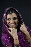 Portrait of smiling beautiful indian girl photo