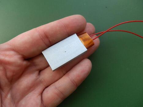 Accessory for smartphone and computer in hand photo