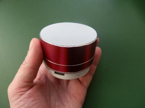 Accessory for smartphone and computer in hand photo