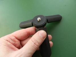Accessory for smartphone and computer in hand photo