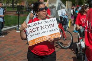 WASHINGTON D.C., USA - MAY, 2 2014 -  Immigrant outside the white house protesting for house photo