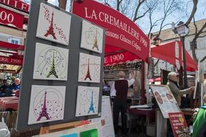 PARIS, FRANCE - MAY 1 2016 - Artist and tourist in Montmartre photo