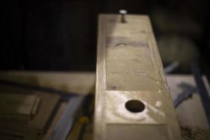 Carpenter makes wood. Board processing. photo