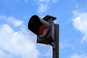 Flashing lights installed at junctions to reduce accidents for drivers to be careful before reaching the junction. The lighting system is used for clean energy. Installed solar panels on top. photo