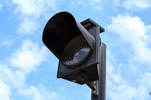 Flashing lights installed at junctions to reduce accidents for drivers to be careful before reaching the junction. The lighting system is used for clean energy. Installed solar panels on top. photo