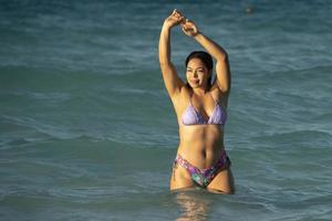 beautiful black hair girl mexican latina portrait on baja california beach photo