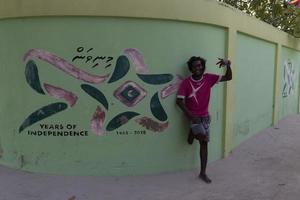 happy Young maldivian man portrait photo