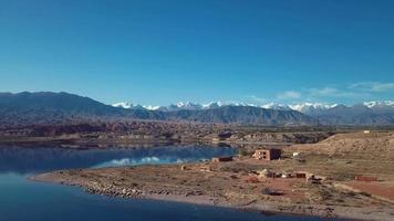 Panoramic views of the mountains and Lake Issyk Kul in Kyrgyzstan, Aerial video