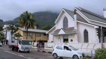 Victoria streets with people and cars, Mahe Island, Seychelles video