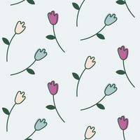 Seamless pattern with multicolored tulips. The plants are spread out on a light blue background. Vector illustration in doodle style.