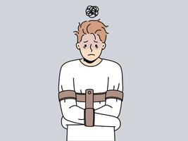 Stressed man in straitjacket suffer from mental problems. Unhappy guy struggle from psychological issues in psychiatric hospital. Vector illustration.