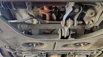 Bottom View Of A Car Parts In A Car Repair Service