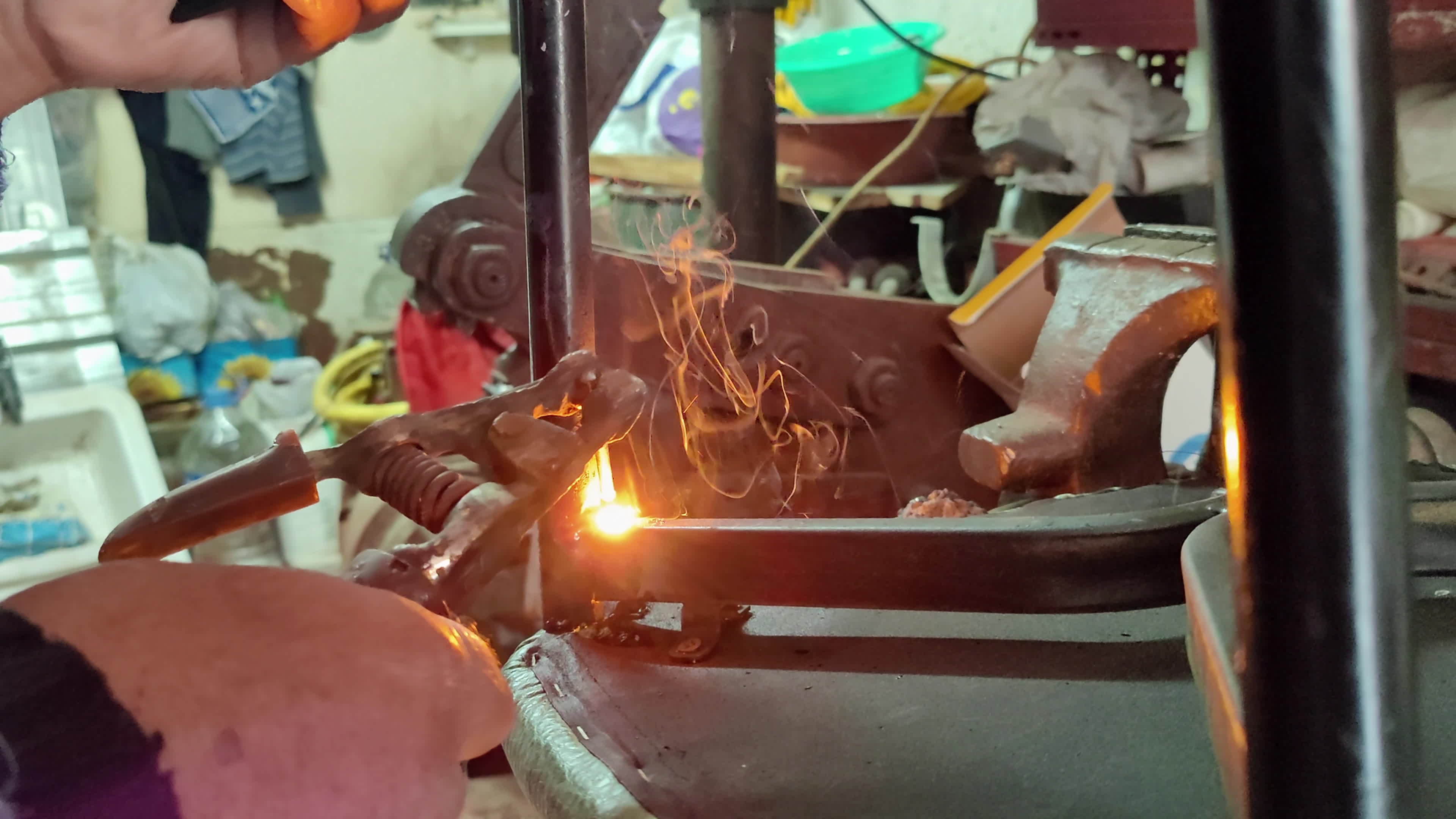 Old Man Repairing Broken Metal Chair Leg With Electric Welding 20379828