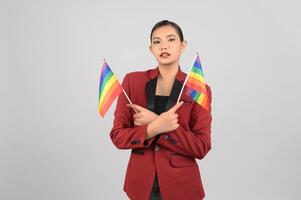 Pretty woman LGBQ pose with muli-color flag photo