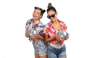 Portrait two women in Songkran festival with water bowl photo