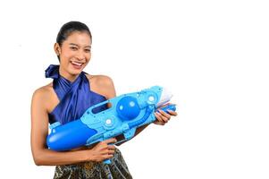 Portrait pretty woman in Songkran festival with water gun photo