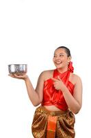 Portrait beautiful woman in Songkran festival with water bowl photo