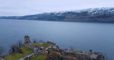 Aerial view of Urquhart Castle on Loch Ness in Scotland video