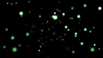Loop glow green particles animation falling down background video