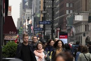 NEW YORK - USA  MAY 4 2019 - Times square full of people photo