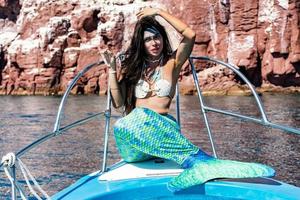 Black hair Mermaid portrait on a boat photo