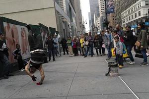 NEW YORK, USA - MAY 7 2019 - Break dancer in 5th avenue photo