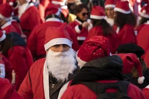 GENOA, ITALY - DECEMBER 22 2019 - Traditional Santa claus walk photo