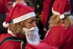 GENOA, ITALY - DECEMBER 22 2019 - Traditional Santa claus walk photo