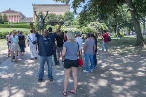 PHILADELPHIA, USA - JUNE19, 2016 - Tourist taking selfies at Rocky statue photo