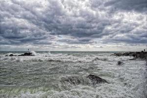 Sea Storm tempest on the rocks photo