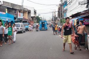 CEBU - PHILIPPINES - JANUARY,7 2013 - Town street congested traffic photo
