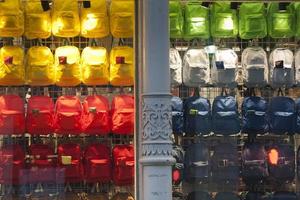 Colorful backpacks in New York Broadway Shop photo