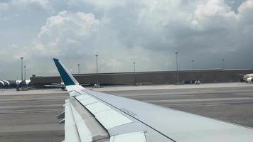 Airplane flight. Wing of an airplane flying above the clouds. video