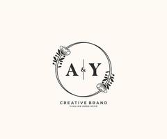 initial AY letters hand drawn feminine and floral botanical logo suitable for spa salon skin hair beauty boutique and cosmetic company. vector