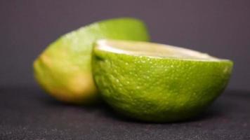 Lime on a black background rotates video