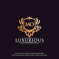 MO initial letter luxury ornament gold monogram logo template vector art.
