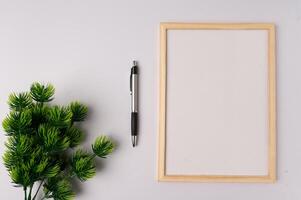 Whiteboard and decorations on white background photo