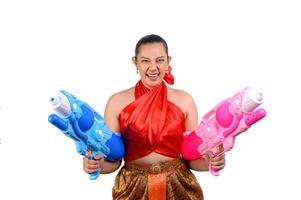 Portrait beautiful woman in Songkran festival with water gun photo