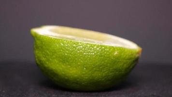 Lime on a black background rotates video