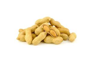 pile of peanut with shell on white background photo