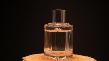 Perfume on wood Transparent perfume bottle video