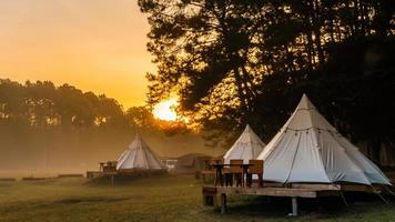 Tent camping in the morning . At Thung Salaeng Luang National Park Phetchabun Province, Thailand photo